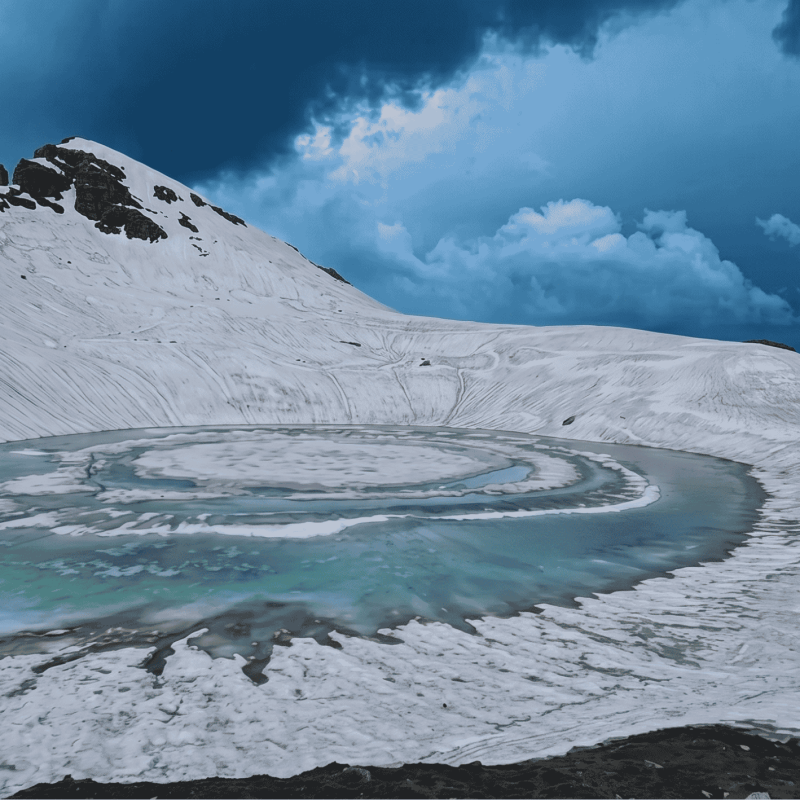 Trekking Cougars group at Bhrigu Lake summit celebrating successful trek Title: Trekking Cougars Team at Bhrigu Lake